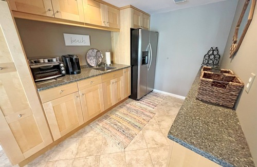 Summersea House | Waterfront home with private boat dock, heated pool, kayaks, A/C, and more
