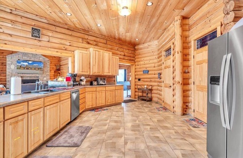 High Point House | Waterfront Log Home, Fire Pit & Table, Swim Spa, & Game Room