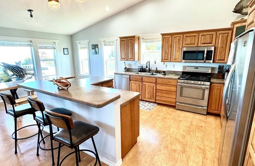 Happy Valley House | Waterfront retreat with stunning views of Iliamna Volcano: The View - Full House
