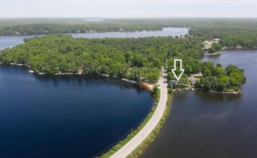 Newaygo Apartment | Waterfront Suite with Dock, Firepit, BBQ