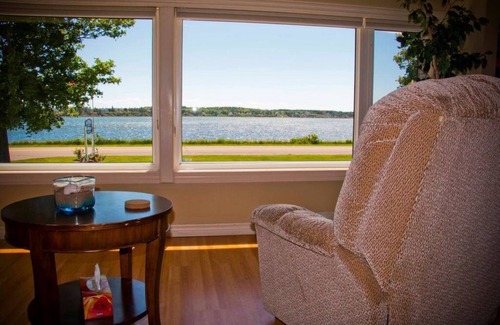 Stanhope House | Waterfront Vacation Home-Laundry inside、Air Conditioner-Perfect location!