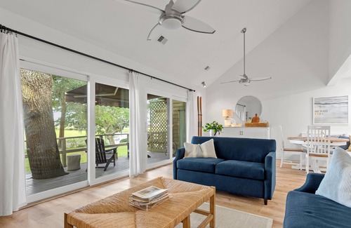 Pine Harbor House | Waterfront views of the beautiful Sapelo river from the living room and porch!