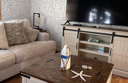 Treasure Lake House | Waterfront with dock on friendly private lake.