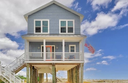 Little Creek House | Welcome to the waterfront oasis in the serene community of Kitts Hummock Beach!n