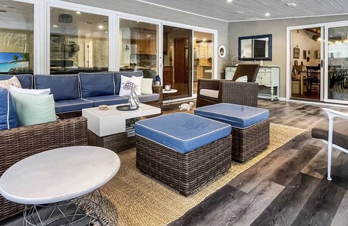 Menominee House | Well-appointed River home w/pool, screened porch, freestanding tub
