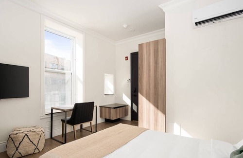 Latin Quarter Apartment | Well-equipped bedroom in downtown