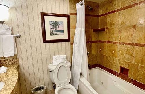 Chinatown Hotel | Westchase Escape with Breakfast, Outdoor Pool, and Quick Drive to CityCentre