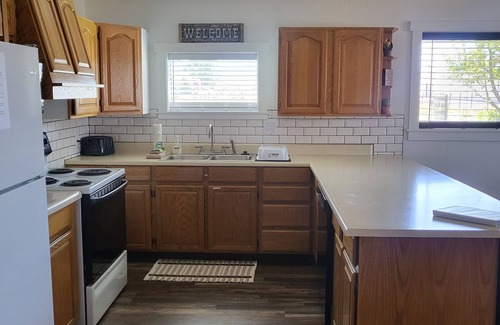 Salina House | Western Charm Getaway, Spacious 2BR Near I-70 in Salina. Single level no stairs