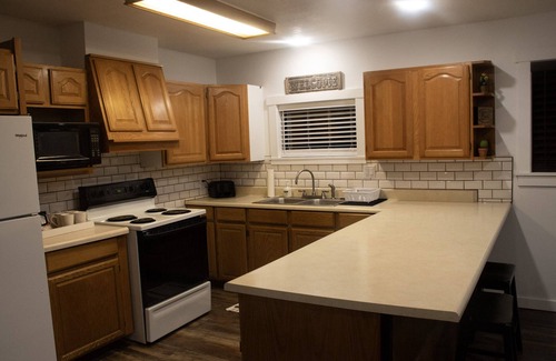 Salina House | Western Charm Getaway, Spacious 2BR Near I-70 in Salina. Single level no stairs