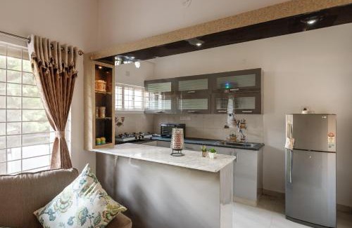 Yelahanka Apartment | Whispering Willows By Red Olive 3BHK Near Airport