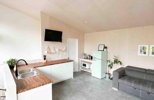 Ucluelet Apartment | WHITE HAUS nested in Rainforest close to beach and trail