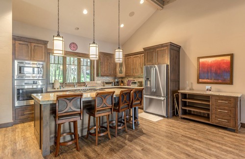 Lakeside House | Wilderness retreat with a large deck, grill, updated interior, fireplace, and AC
