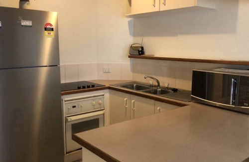 Golden Beach Apartment | WINDBOURNE UNIT 8 - This neat and tidy 1st floor unit is tucked away in the quiet section of the Gol