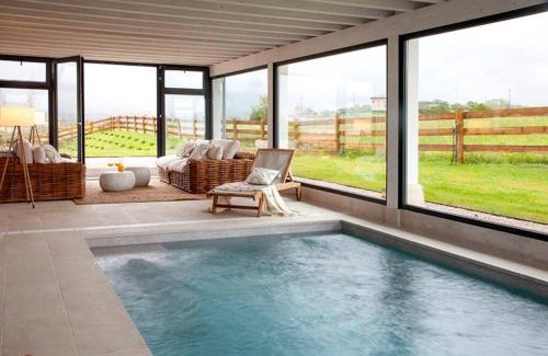 Prellezo Villa | Wishome- Increíble casa con vistas al mar y Picos de Europa - Piscina climatizada