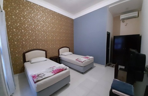 Palangkaraya House | Wisma Liontine