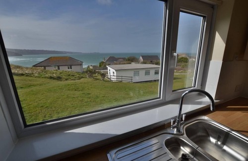 Hayle Cottage | With a bright ocean facing living room and double doors which take in the views towards St. Ives bay