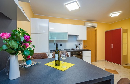 Fazana Apartment | Wonderful apartment for 4 people with pool and garden
