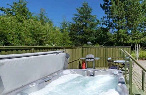 Llandysul House | Wonderful private villa for 4 guests with WIFI, hot tub, TV, patio, panoramic view and parking