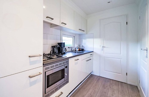 Dordtse Biesbosch House | Wonderful private villa for 4 guests with pool, WIFI, TV, terrace and parking