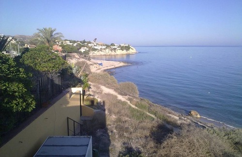 Coveta Fuma House | Wonderful Villa with Private Beach, Sea View, Shared Pool, Terrace & Wi-Fi