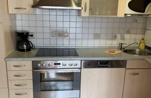 Waldsiedlung Romerstraße House | Wooden holiday home with winter garden