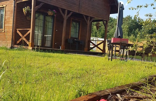 gmina Osiek House | Wooden Holiday Home in Skrzynia with Terrace