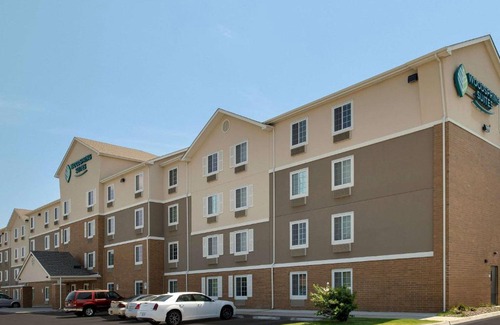South Tulsa Hotel | WoodSpring Suites Broken Arrow