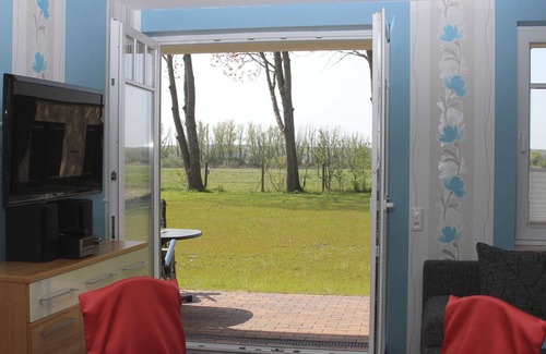 Borgerende Apartment | Wunderschöne Ferienwohnung mit Kamin, Fußbodenheizung und Blick in die Natur und nur 200 m bis zur Ostsee