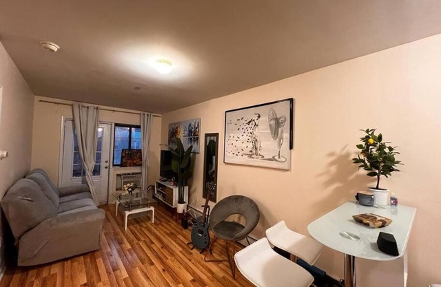 15 minutes to Manhattan with Balcony. Train is walking distance