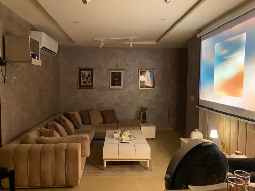 1BHK Apartment with Projector & Eiffel View Ideal Urban Retreat
