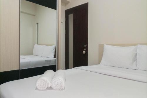 1BR with Cozy Design at Uttara The Icon Apartment By Travelio
