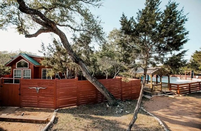 2 cabins across from each other and a shared pool!