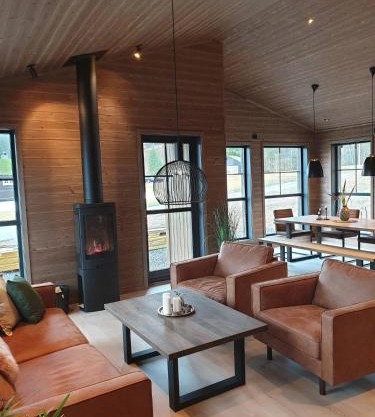 2 cabins surrounded by beautiful nature