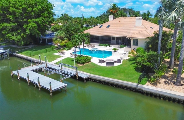 4 BR/3 BA Lido Canal Home by FVC