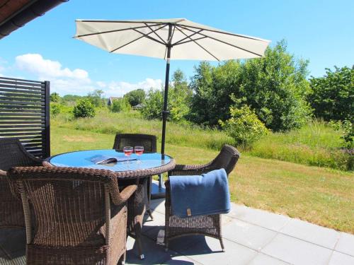 4 person holiday home in R nne