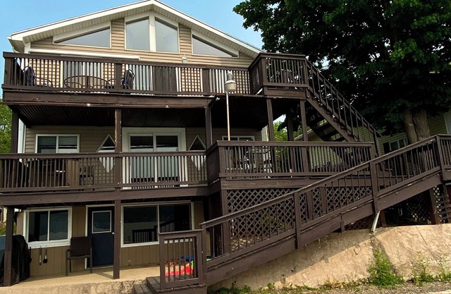 4 season escape boasts 5 beds and now a HOT TUB to enjoy any time of year!