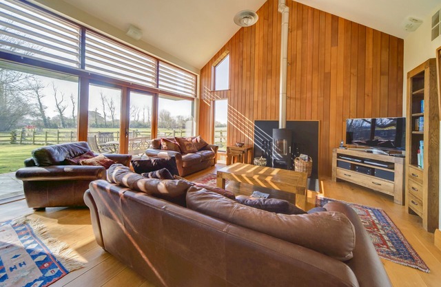 5* Converted Barn in an area of 'Outstanding Natural Beauty'. Sleeps 6 + baby