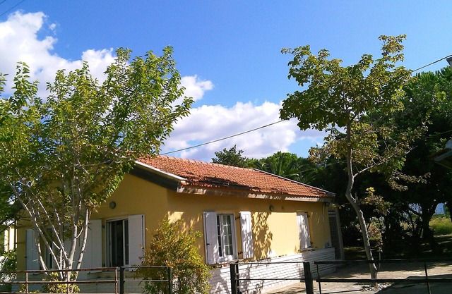 5m from the sea, family friendly, large garden with trees.