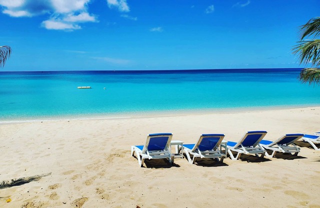 7 Mile Beach Private Beach Club. Ocean views from Roof Terrace and Pool Pavilion