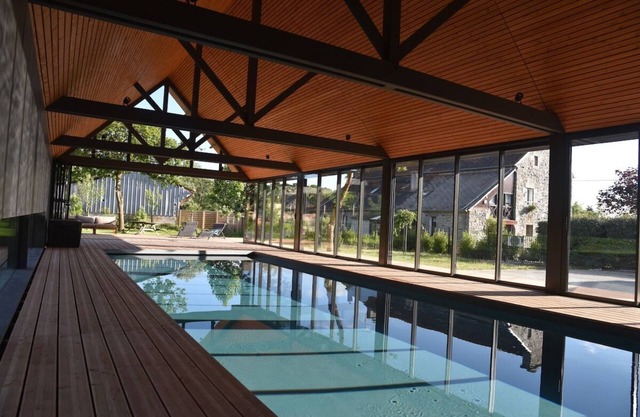 a charming apartment inside an old farm, with swimming pool