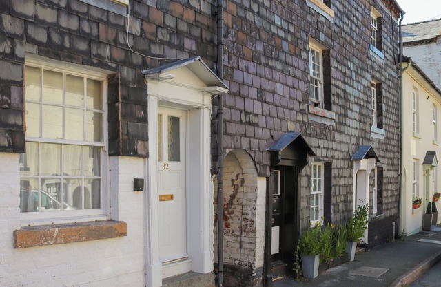A charming townhouse in the heart of Newtown, set on a lovely street.