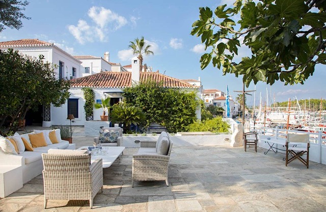 A lovingly maintained four bedroom waterfront house with a unique veranda