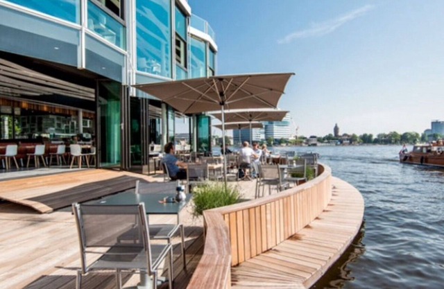 A romantic and unique design house boat on the Amstel river in Amsterdam