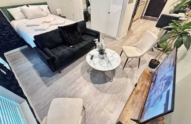 A spacious studio type apartment with full kitchen and complete basic amenities