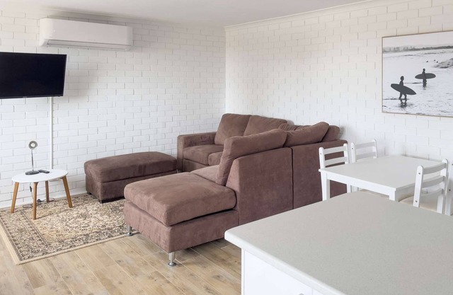 Absolute beachfront! Freshly renovated beachy apartment. Free WIFI