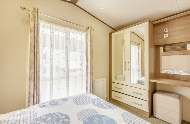 An attractive modern 12ft-wide caravan.