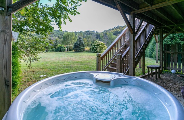 Andrews River Haven - River Front with hot tub-Cozy, Fun for Kids, Pet Friendly!