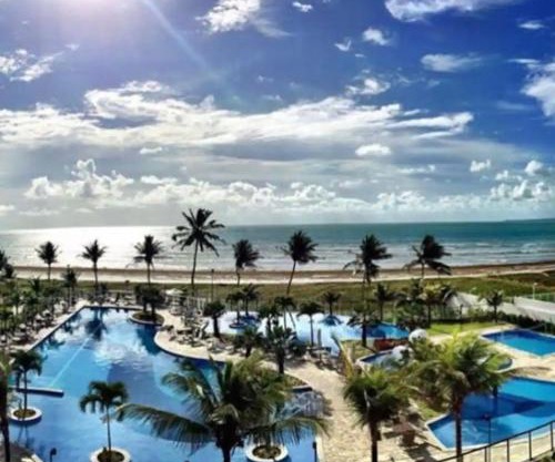 Apartamento a beira-mar com piscina