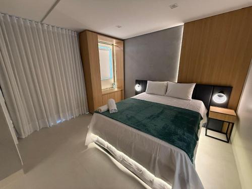 Apartamento com suíte e varanda no centro