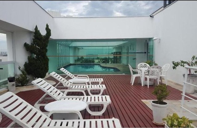 Apartamento pé na areia com piscina aquecida